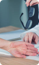 A female patient shows a female doctor where she is having pain in her wrist.