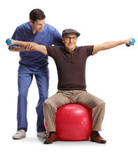 An elderly man sits on an exercise ball holding his arms straight out to his sides, and holding small dumbbells. A physical therapist is assisting him.